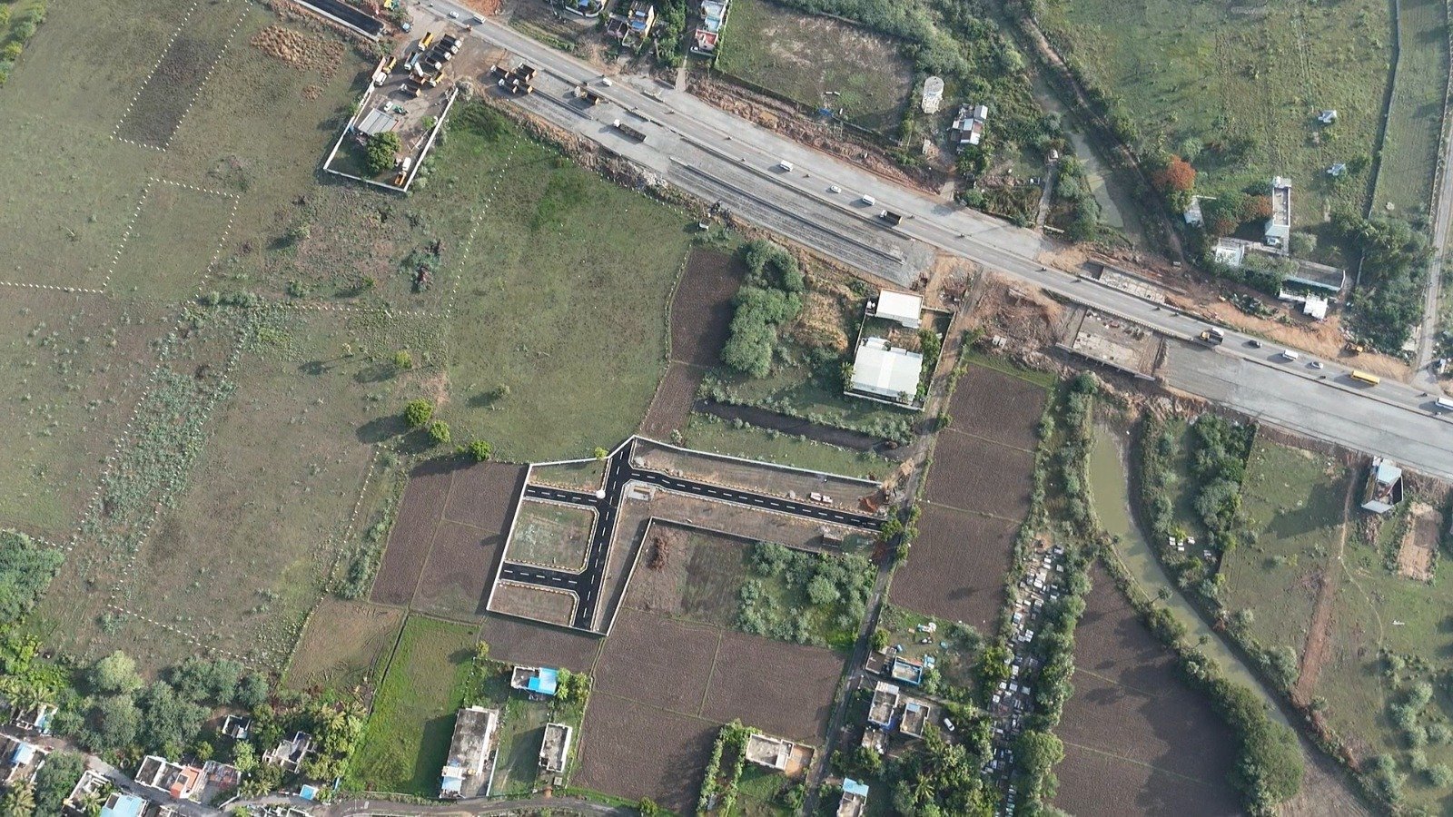 Panoramic aerial viewpoint overlooking the plotted community